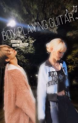 Boy playing the guitar
