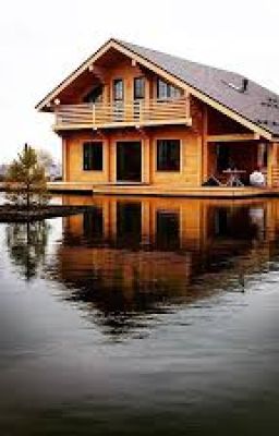 отдых в деревянном домике на берегу реки